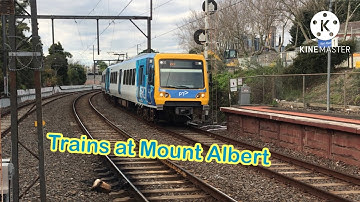 Trains at Mount Albert station (prior to the level crossing removal)
