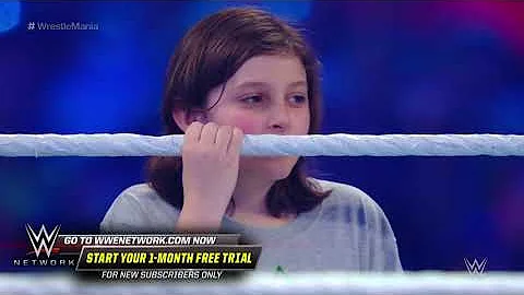 Young WWE fan Nicholas teams with Braun Strowman a...