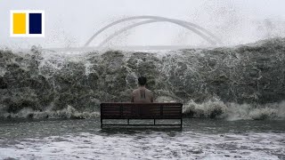 The photographer who snapped the viral man-on-bench photo as Super Typhoon Ragasa hit Hong Kong
