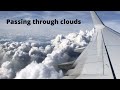 Airplane flying between clouds #shorts