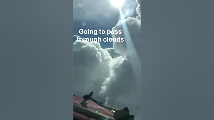 Airplane flying between clouds #shorts