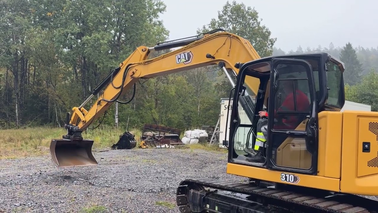 Bandgrävare CAT 310