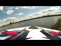 Traxxas Spartan chasing ProBoat Sonicwake