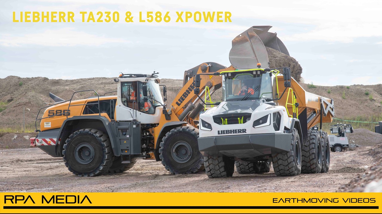 Liebherr TA230 ADT and L586 XPower loader moving sand