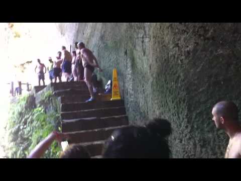 Jumping off Ledge at Ik Kil Cenote near Chichen Itza, Yucatan, Mexico