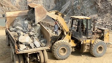 Massive Rocks Loading with Caterpillar Machine | Heavy Equipment in Action