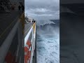 bigwaves encountering the fully loaded tanker ship in Pacific ocean