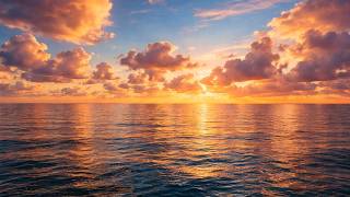 Ocean Waves at Sunset Beneath Endless Clouds