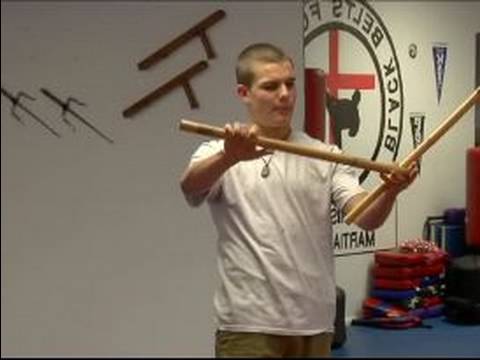 Escrima and kapap instructor demonstrates sticks fighting