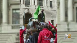 Iconic Charging Bull Statue Vandalized During Climate Change Protest