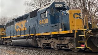 After many hours CSX M426 starts up with 2 SD40-2s #8400 and #8842 in the miserable heavy rain
