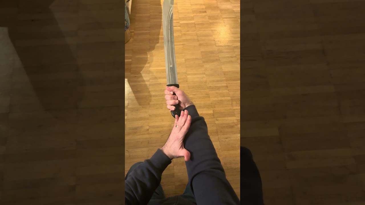 Using the back of a qaddare and a thrust 