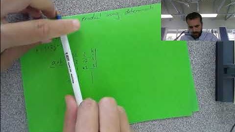 The vector product using determinants