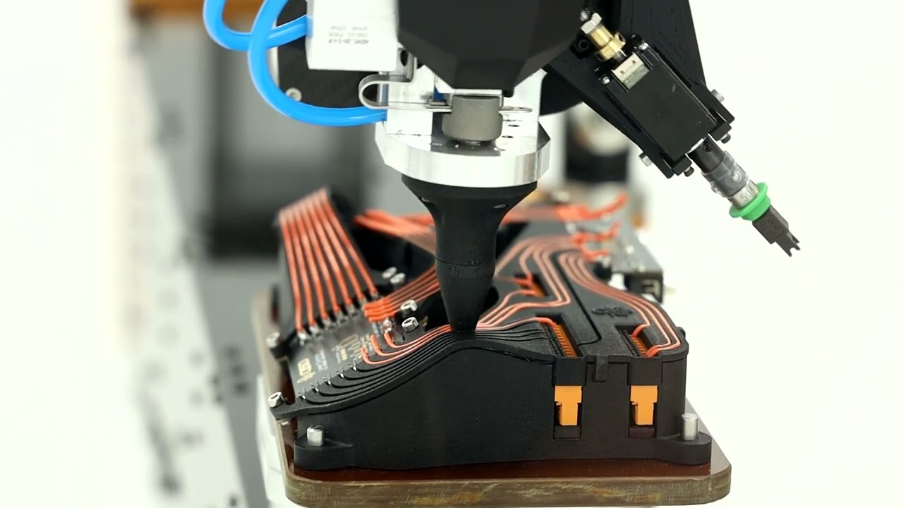 Q5D Hardware and demonstration of automated wiring and polymer protection