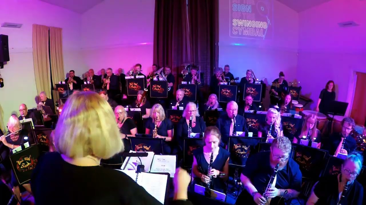 At the sign of the swinging cymbal - arr. Ray Woodfield. WorleWind Band