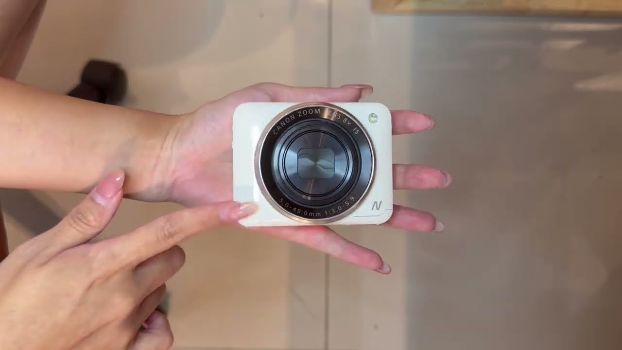 Reviewing the popular tofu cube camera: Canon Powershot N2 - YouTube