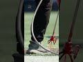 the finishing touches of paint on the turf before the REDBLACKS football game