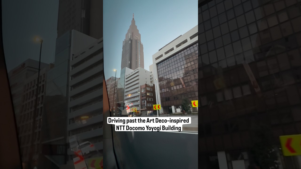 Driving past the Art Deco–inspired NTT Docomo Yoyogi Building, a Shinjuku landmark echoing New York