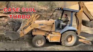 TURBO CASE 580 BACKHOE FINISHING THE POND JOB WITH THE