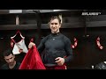 Matvei Gridin is awarded the Flames Player of the Game jacket