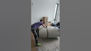 Wrapping a foldable mattress // MINDFUL MOVING AND STORAGE