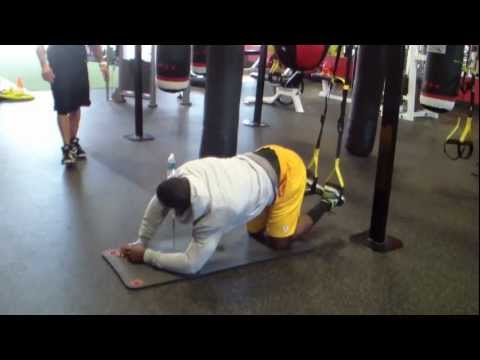 Co-Owner/Strength Coach Shaun Nunes and James Jones going through a circuit of upper body strength and core endurance at the end of a brutal trial workout at Total Performance Fitness Training Center in Tracy, Ca. wwww.tpftracy.com check us out WE DO WORK!