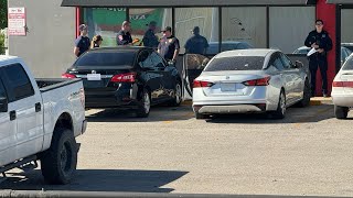 Man shot, killed while sitting in vehicle at Northeast Side shopping center