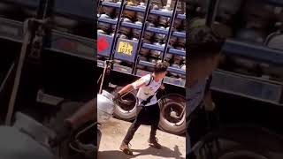 Loading Gas Cylinders onto a Truck - Good tools and machinery make work easy
