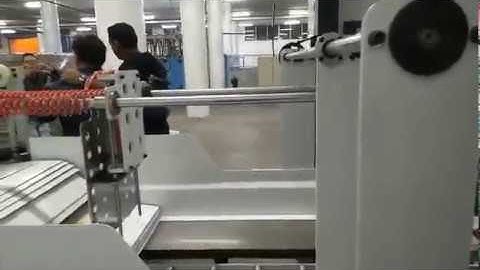 YB-1450HS servo type laminating machine and stacker running in our Jordan customer