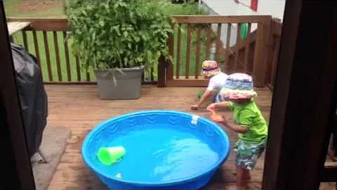 Reagin boys playing in kiddie pool at grandmas house