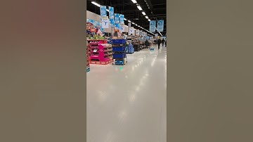 Serena robots moving down a long aisle