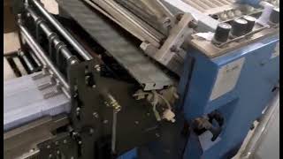 MBO paper folding machine with AQ stacker