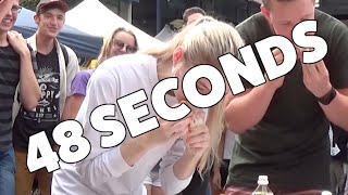 Girl Destroys Sausage Eating Contest!