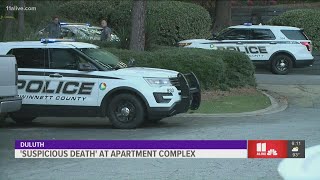 Police say body of man found outside Duluth apartment building