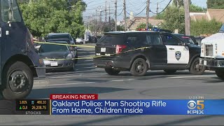 Man With Rifle Barricaded In Oakland Home With 2 Children Inside