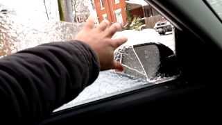 Ice Storm 2013 - Cleaning off the car windows