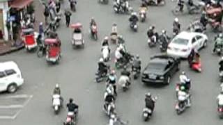 Traffic intersection in Hanoi near the lake