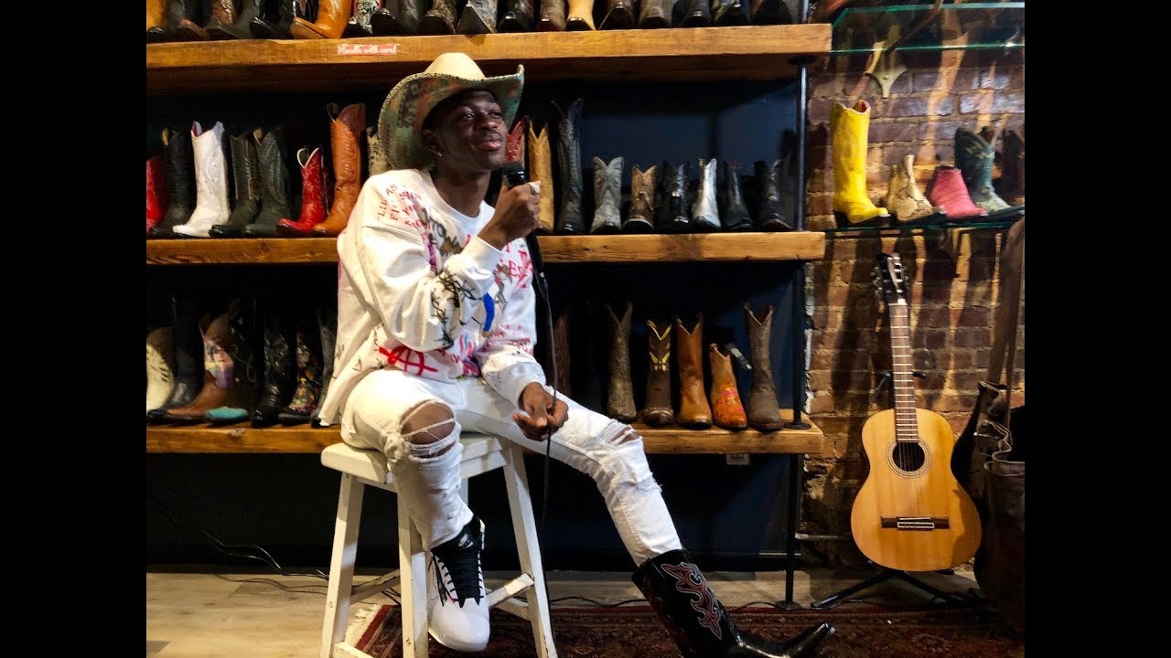 Watch LIL NAS X choose new cowboy boots & hat while revealing the true story of "Old Town Road ...