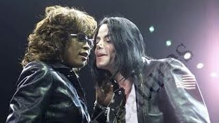 Whitney Houston hugging  Michael Jackson