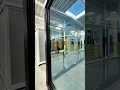 20ft brown expanded container house with glass curtain wall