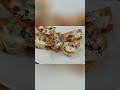 Delicious Cheesy Bites: Perfect Golden Brown Topping! #shorts