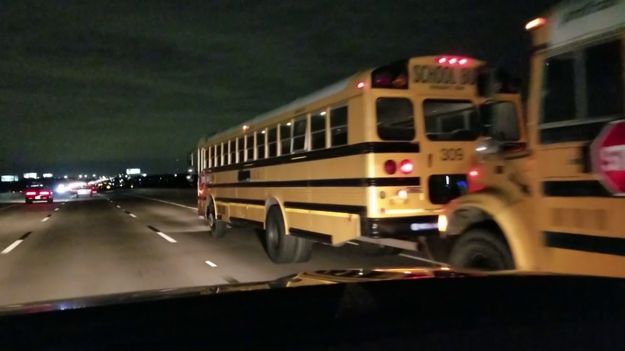 Caravan of Yellow School Buses Towing A School Bus YouTube