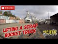 Lifting A Scrap Bucket Truck