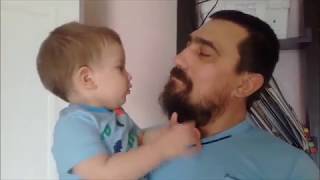 Реакция малыша на сбритую бороду папы!!!!