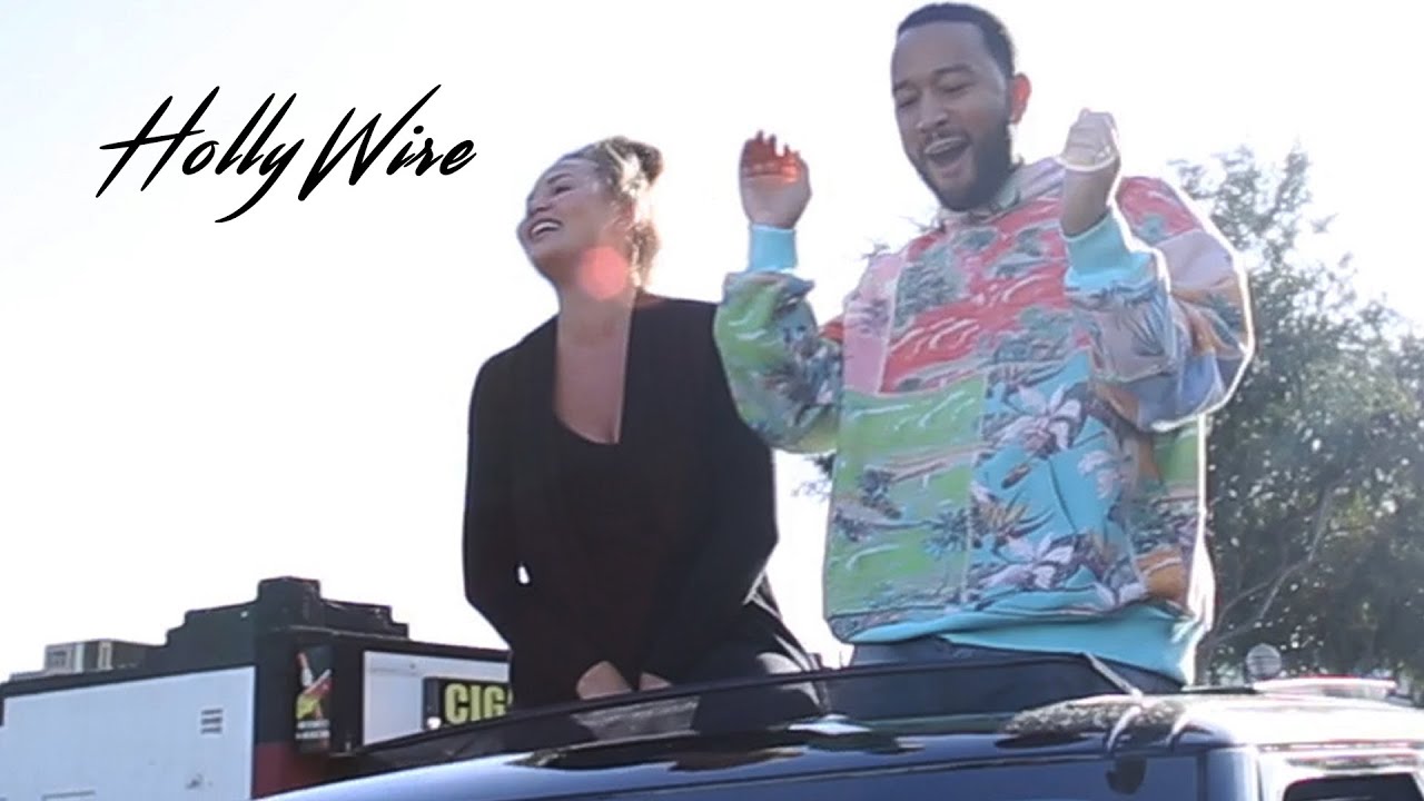 John Legend & Chrissy Teigen dance on a car & celebrate Joe Biden's victory | Hollywire