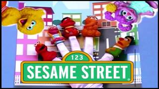 The Finger Family NURSERY RHYME Song with SESAME STREET toy Finger Puppets