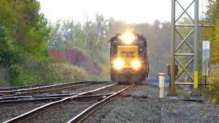 CSX Train Passes Slower CSX Train That Stops