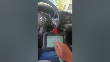 2010 Nissan Cube... Car key programming w/ auto pro pad  automotive locksmith southgate michigan