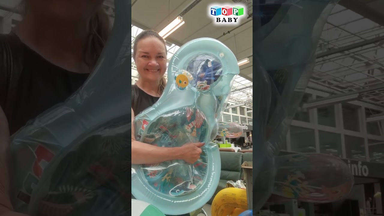 Deflating an inflatable mat WATERMAT Oceaan. Second-hand shop with inflatable toys.