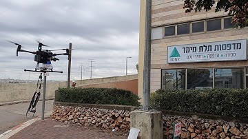 Matrice 200 payload drop system by gimbal guard team